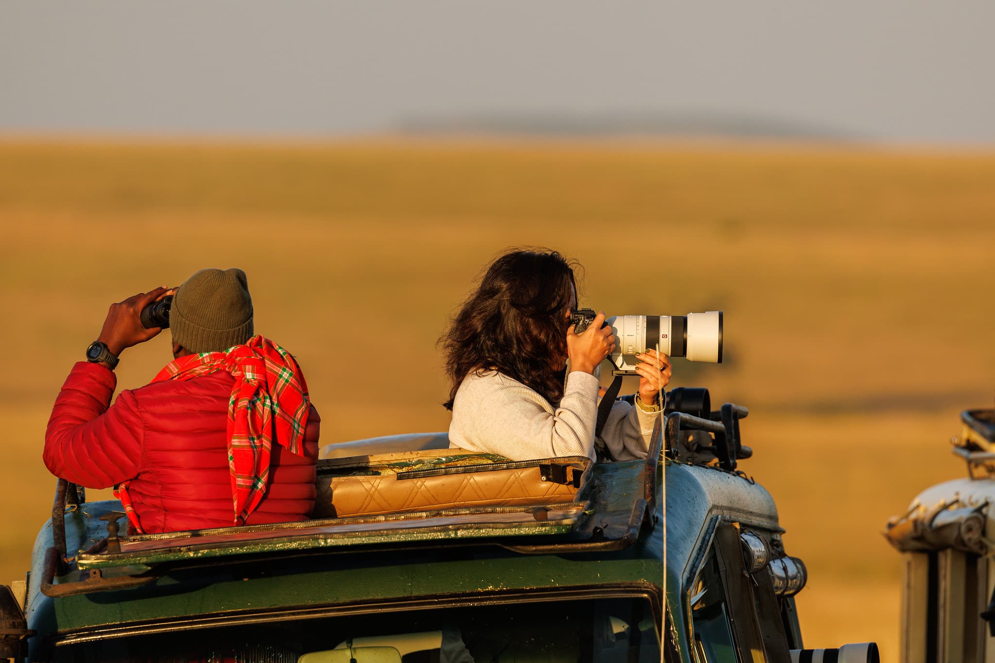 Guest photographing wildlife during golden hour on a fototrails 365 safari. © Nitin Vyas